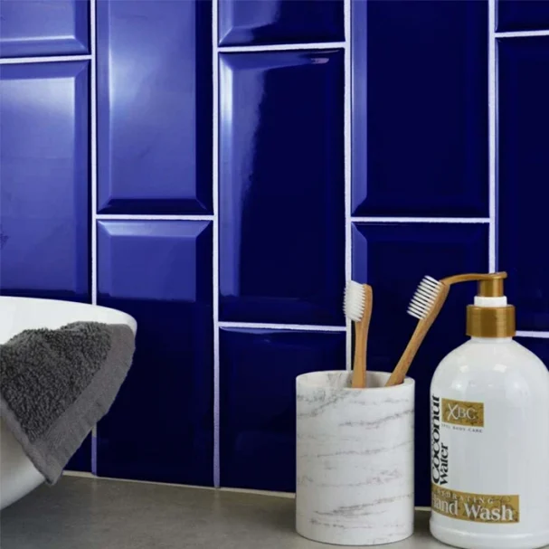 metro dark blue wall tile on a splash back, in gloss finish 100x200mm