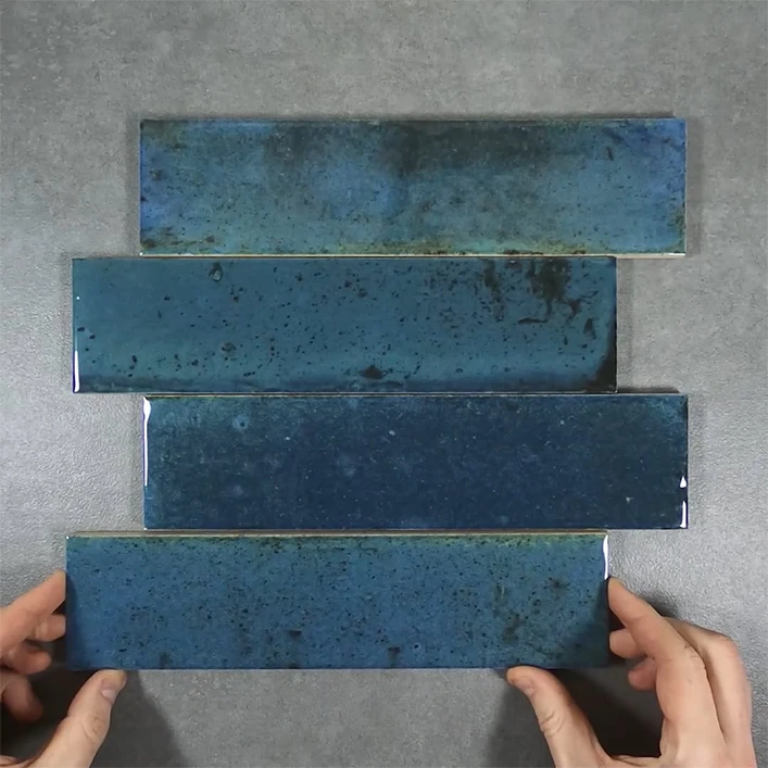 Rustic blue ceramic wall tile demonstration video.
