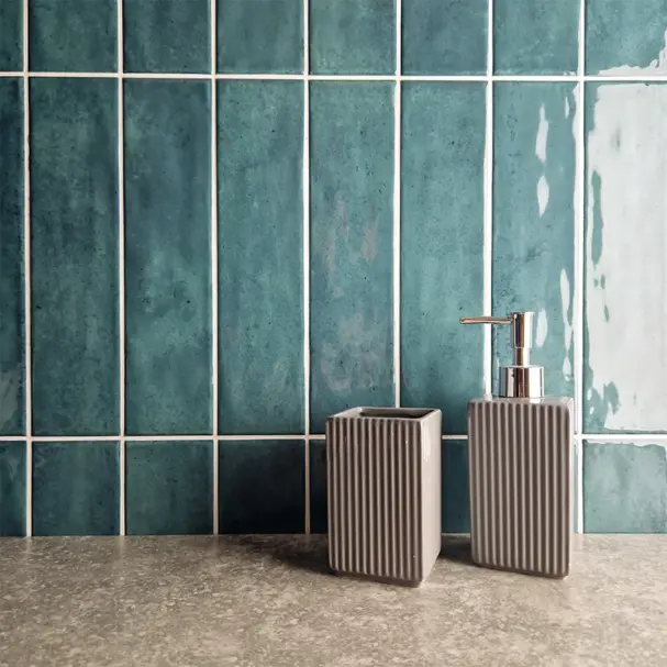 nebula rustic green ceramic wall tile on a splash back in soldier style 75x300mm gloss finish