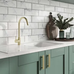 marble effect metro wall tile on a kitchen splash back