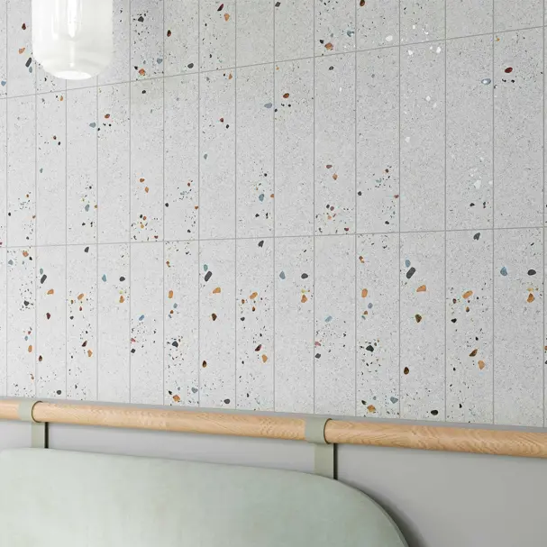 terrazzo grey 75x300 ceramic wall tiles in subway style.