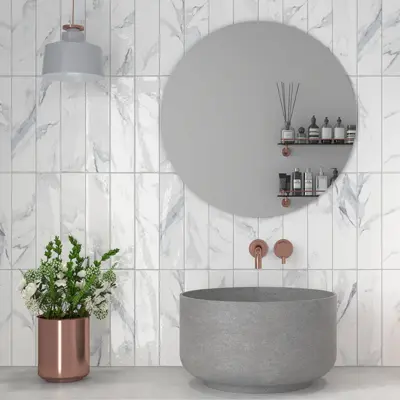 marble grey subway tiles in 75x300mm on a bathroom wall in soldier style.